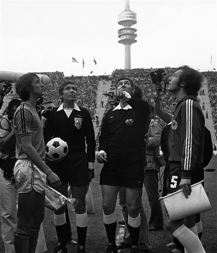 Jack Taylor performing the coin toss for the 1974 World Cup final with Johan Cruyff and Franz Beckenbauer Jack Taylor performing the coin toss for the 1974 World Cup final with Johan Cruyff and Franz Beckenbauer